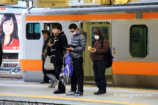 Some locals waiting for their train to Tokyo Station