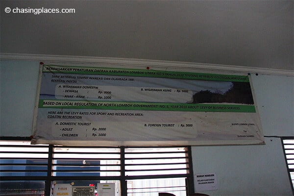 Additional charges to visit the Gili Islands posted in Bangsal's dreary ticket office