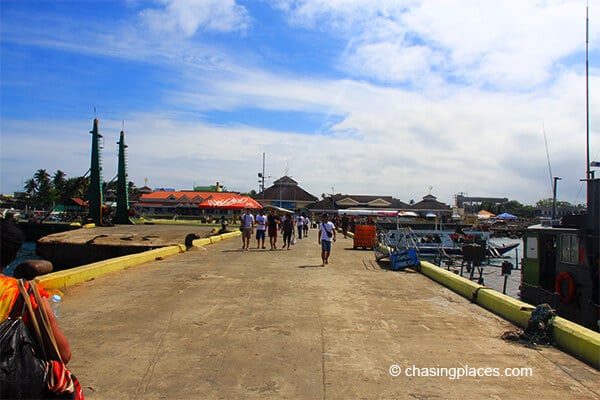 If you walk straight ahead you will reach the caticlan ferry office from there take a shuttle to Kalibo Airport