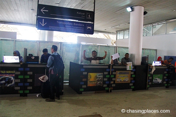 Transport companies have their own desks at the airport. But you can also go out of the airport and negotiate directly with a taxi driver. 